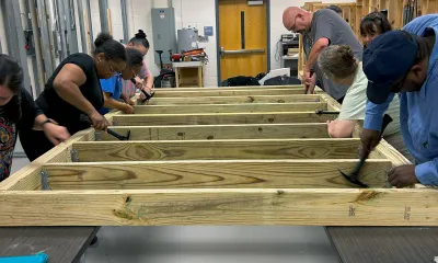 Students working on a deck