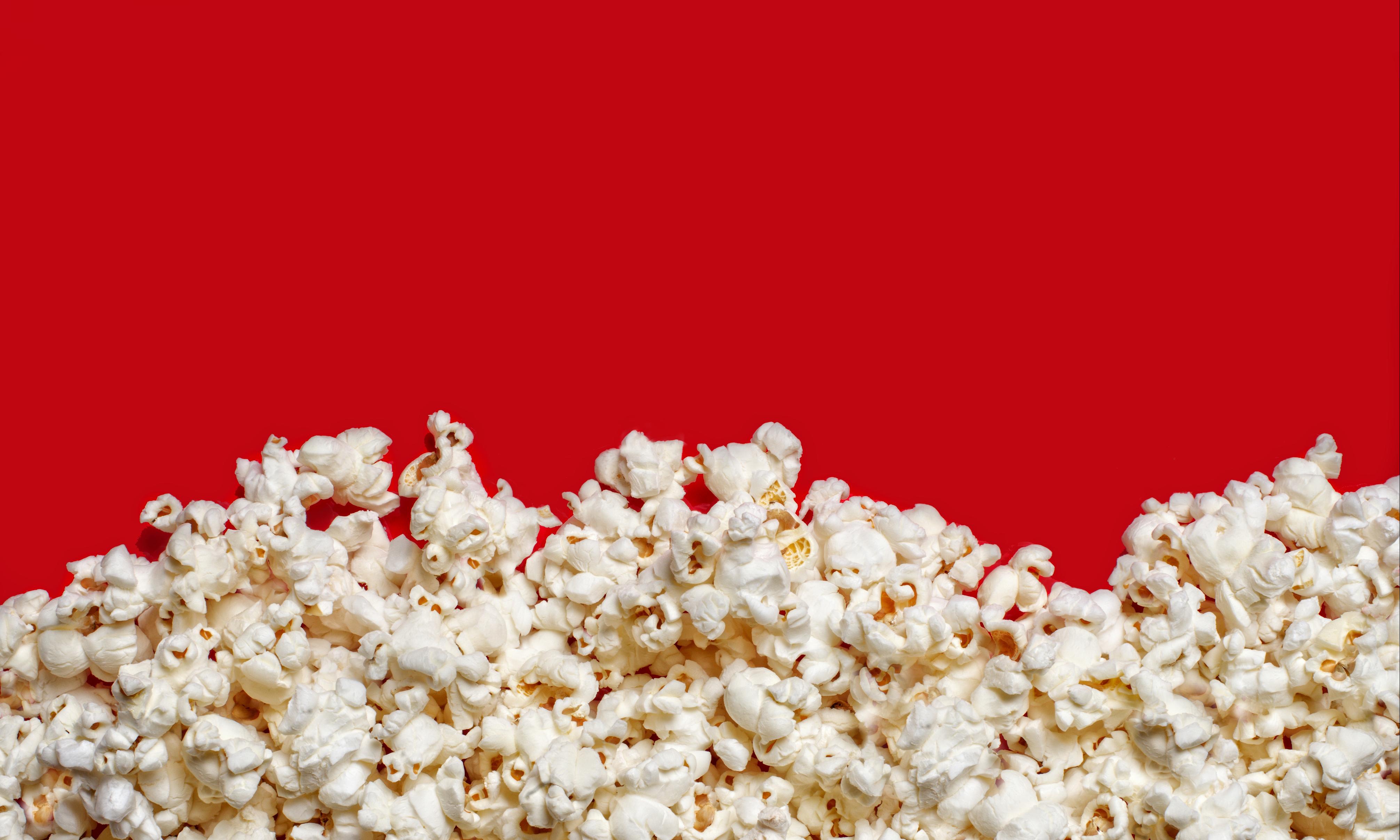 Popcorn on red background